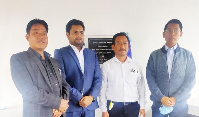 ADC Tuensang & Chairman District Urban Development Agency, Ajit Kumar Verma during the inaugurating of the street vendors market at Officers Colony in Tuensang Town on August 15. (DIPR Photo)